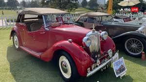   गुरुग्राम में &lsquo;विंटेज कार शो&rsquo; में आकर्षण का केंद्र रही &lsquo;लाल परी&rsquo; एमजी रोडस्टर