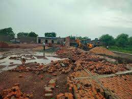 नगोई में नाले पर किए गए अवैध कब्जे पर चला बुलडोजर नगोई में नाले पर किए गए अवैध कब्जे पर चला बुलडोजर